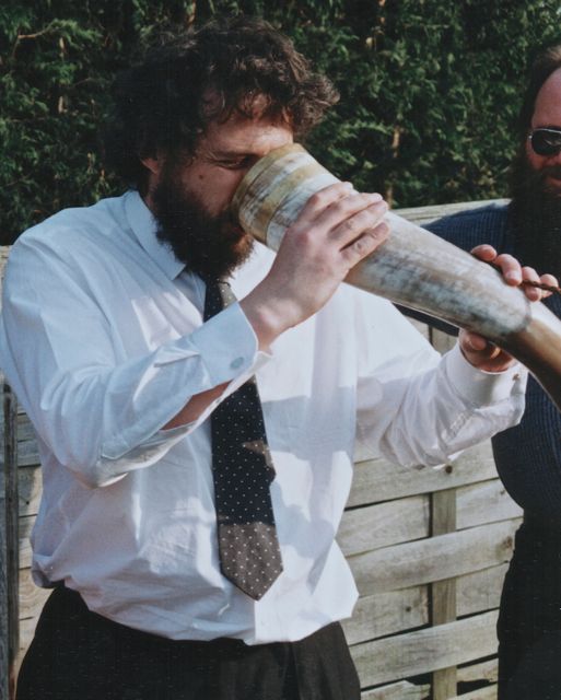 Andy with horn 2 Alice's christening